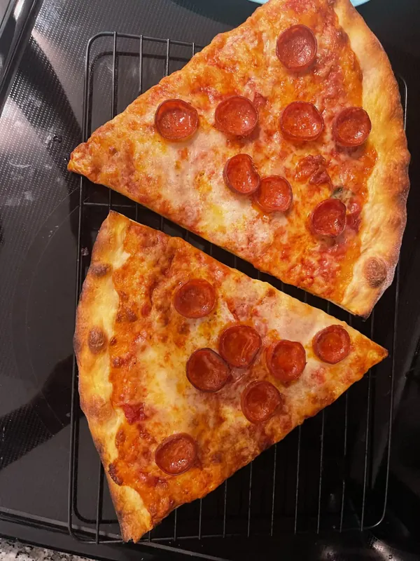 Two big pepperoni slices